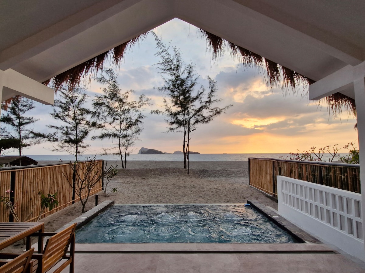 Villa veranda with pool at sunset